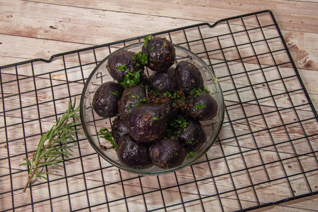Roasted Herb crusted purple potatoes 