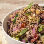 Finished greek quinoa salad bowl